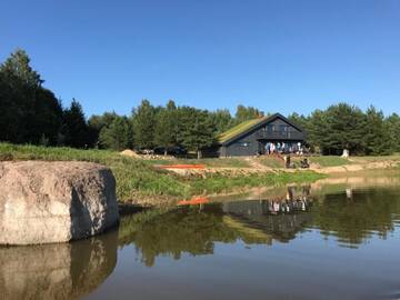 Фото номера Дом с 4 спальнями Дома для отпуска Atpūtas parks Priežvanagi г. Livža 22